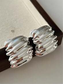 1 paire de boucles d'oreilles en métal courbé de style européen et américain exagéré et nouveau