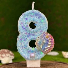 Bougie d'anniversaire créative avec perles fausses en coquille, motif océan bleu. Décoration de gâteau étincelante pour créer une atmosphère festive significative pour anniversaire, Noël