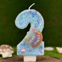 Bougie d'anniversaire créative avec perles fausses en coquille, motif océan bleu. Décoration de gâteau étincelante pour créer une atmosphère festive significative pour anniversaire, Noël