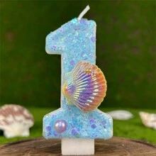 Bougie d'anniversaire créative avec perles fausses en coquille, motif océan bleu. Décoration de gâteau étincelante pour créer une atmosphère festive significative pour anniversaire, Noël