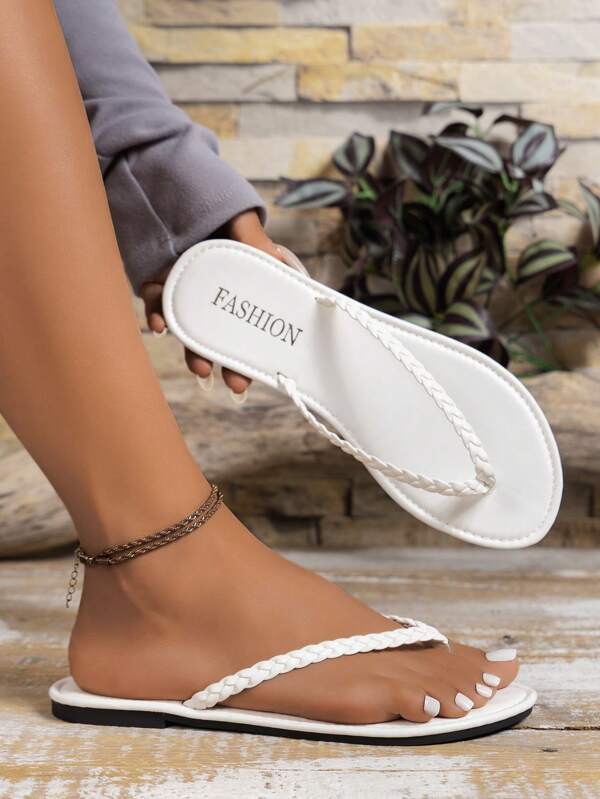 Sandalias planas tejidas a la moda con correa en el dedo del pie para mujer