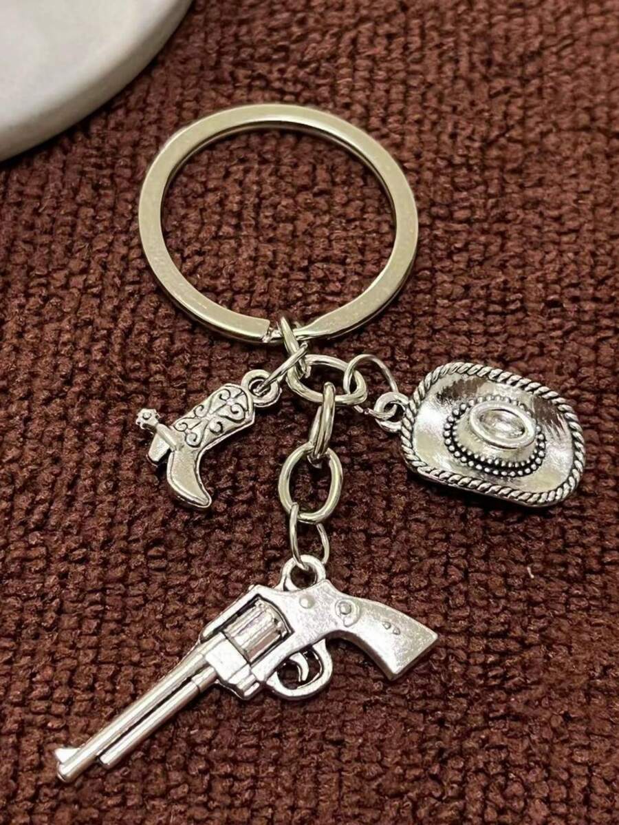 1 pieza Llavero de pistolero vaquero occidental con sombrero vaquero en miniatura, botas de montar y pistola para colgar en la mochila - Plateado - Ver 1