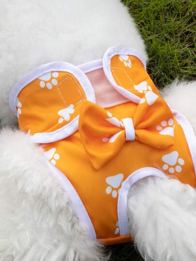1 pieza/2 piezas Bragas menstruales para perras y gatas con estampado de pata y lazo de color naranja, adecuado para mascotas pequeñas/medianas, antiacoso