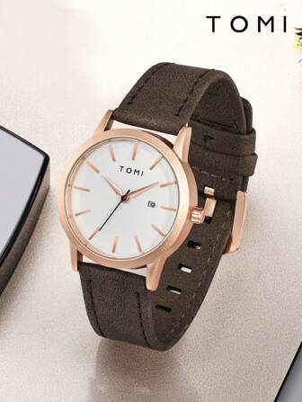  1 件 TOMI 复古铆钉表盘日历皮革表带手表，简约紧凑的设计，适合年轻学生