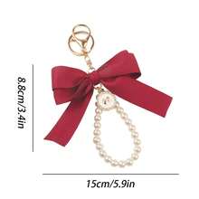 仿珍珠链大蝴蝶结钥匙扣简约时尚包包吊坠汽车钥匙扣个性丝带领结吊坠适合女士包包配饰礼品、礼品、配饰、装饰适合少女女士大学生、新秀和白领人士汽车配饰女士钥匙链饰物、包包吊坠包包配饰仿珍珠钥匙扣可爱仿珍珠串珠手链钥匙扣复古饰物适合女士和女孩的钱包包背包汽车饰物丝带珍珠吊坠情人节 Macrame 钥匙扣 Ch 情人节 - 彩色 - 查看 3