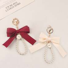 仿珍珠链大蝴蝶结钥匙扣简约时尚包包吊坠汽车钥匙扣个性丝带领结吊坠适合女士包包配饰礼品、礼品、配饰、装饰适合少女女士大学生、新秀和白领人士汽车配饰女士钥匙链饰物、包包吊坠包包配饰仿珍珠钥匙扣可爱仿珍珠串珠手链钥匙扣复古饰物适合女士和女孩的钱包包背包汽车饰物丝带珍珠吊坠情人节 Macrame 钥匙扣 Ch 情人节 - 彩色 - 查看 16
