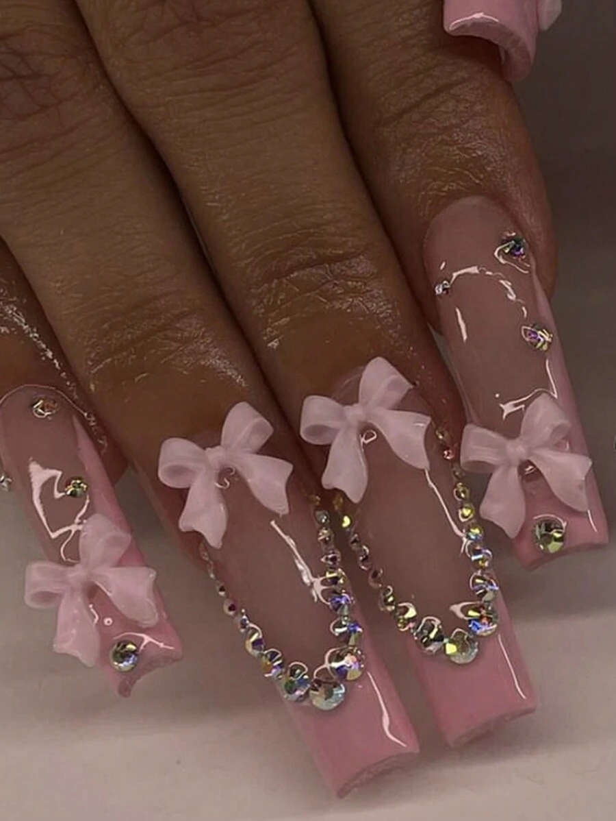 Atualize instantaneamente seu visual com 24 peças Conjunto de Unhas Postiças Quadradas Longas Pressione em Rosa Doce Estilo Francês, Design de Decoração com Laço Rosa 3D Iridescente com Pedrinhas, Unhas Postiças de Cobertura Total para Mulheres e Meninas, Inclui 1 Folha de Adesivos e 1 Lixa Miniatura, Remessa Aleatória de Gel Jelly - Rosa chiclete - Visão 1