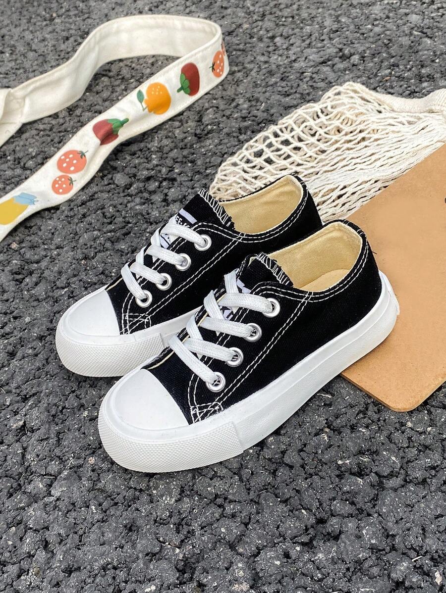 Zapatos de lona para niños OPOEE, para primavera/otoño, estilo coreano, sencillos, para niños y niñas, de moda, de corte bajo, casuales, deportivos, clásicos, versátiles, zapatos de skate para niños - Negro - Ver 1
