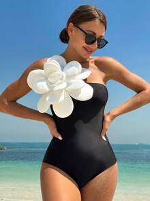 Bikinx Traje de baño de un hombro con aplicación de flor 3D en bloques de color y falda envolvente de encaje para verano - Negro - Ver 3