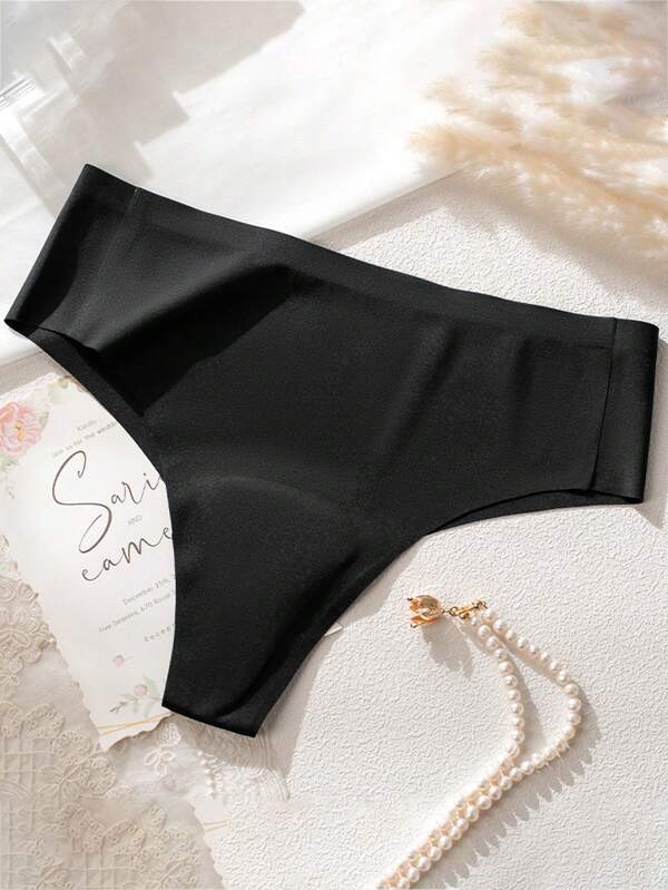 1 pièce Pantalon de yoga noir pour femmes avec pad en latex intégré et sous-vêtement en triangle sans couture, conception anti-vidage