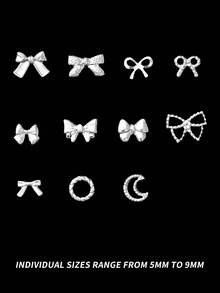 1盒12格藝術合金鉚釘套裝，包含金色和銀色蝴蝶結、星星、月亮和線條圖案，適用於指甲和趾甲裝飾，多種設計可供DIY美甲使用 - 銀色 - 查看 5