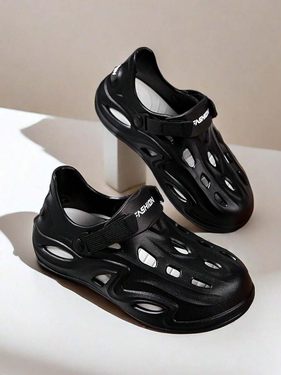 2024年男士夏季新款椰子鞋，EVA材質，時尚印花經典黑白拼接，印花後跟帶，舒適厚底，增高，防滑耐磨，中空透氣，閉口式，適用於戶外運動、海灘、派對、攀登等場合。 - 黑色 - 查看 1