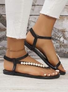 Sandalias planas de mujer en forma de T, estilo romano con decoración de cadena de perlas, cómoda sandalia abierta de punta para la playa con correa elástica en el talón, zapatos deslizantes de moda para el verano, negros - Negro - Ver 4