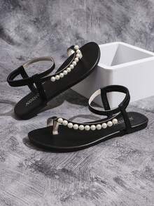 Sandalias planas de mujer en forma de T, estilo romano con decoración de cadena de perlas, cómoda sandalia abierta de punta para la playa con correa elástica en el talón, zapatos deslizantes de moda para el verano, negros - Negro - Ver 6