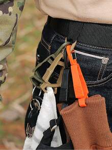 1 pieza Nuevo diseño de pinza ligera para guantes de plástico, pinza conveniente y rápida para colgar guantes para evitar pérdidas, puede ser usado como llavero o pasador de cinturón - Naranja - Ver 3