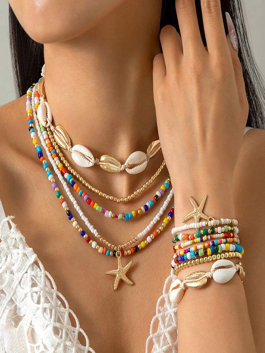 Un nuevo conjunto de 5 collares, 7 pulseras y 7 tobillos con cuentas de conchas y estilo bohemio de vacaciones, con colgantes de estrella de mar y combinación de cuentas de arcilla polimérica, adecuado para el uso diario de la mujer