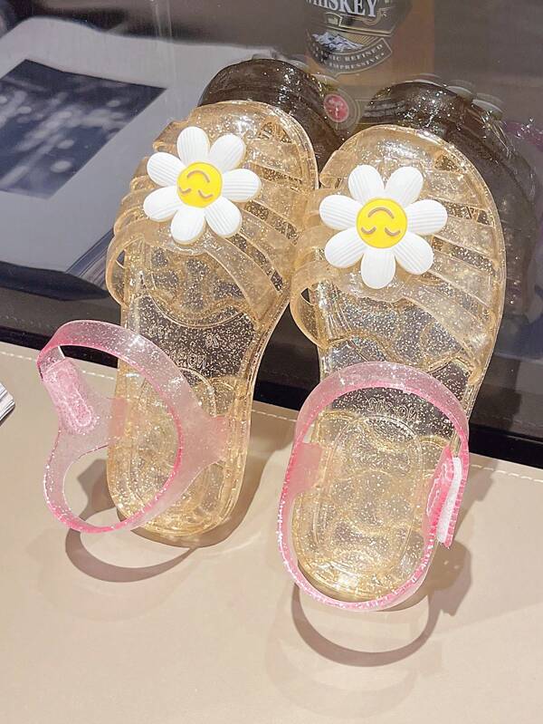Casual Kid Sandals For Girls With Hollow Out Design And Breathable Jelly Material For Spring/Summer. Suitable For Beachwear And Comes With Cartoon Accessories.