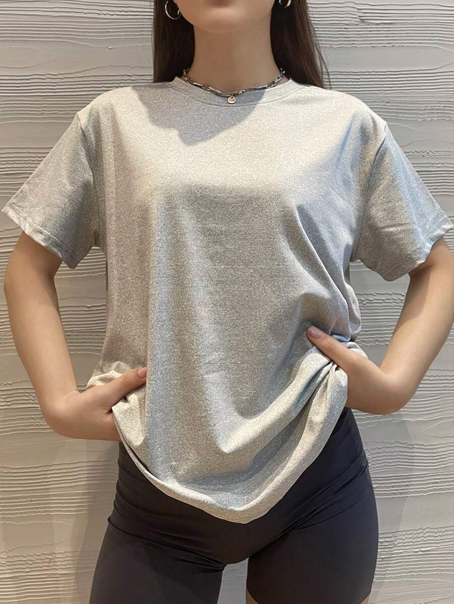 Camiseta básica suelta casual de color gris claro, de manga corta con caída de hombros pequeña - Gris Claro - Ver 1