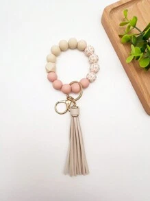 1个波西米亚风印花硅胶珠流苏挂件钥匙扣，可挂在包包上，防丢，是送给朋友、汽车配件、包包挂饰、背包挂件、学生礼物的理想之选。可爱哥特风Y2K风格挂绳，带证件夹，是圣诞节送给老师、姐妹的礼物创意。 - 彩色 - 查看 9