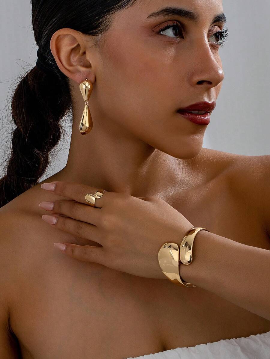 Set de joyas retro y exagerado para mujeres que incluye 1 pulsera abierta geométrica, 1 anillo abierto y 1 pieza de pendientes de gota en forma de lágrima - Amarillo Oro - Ver 1