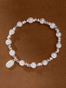 复古925纯银天然珍珠碎片圆盘手链，传统中国风设计，独特的个性化珠宝，原创淡水珍珠弹性手链，略有天然瑕疵，适合日常佩戴或特殊场合佩戴。附赠礼盒。 - 銀色 - 查看 2