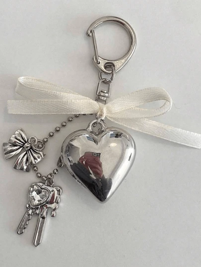 1 móc khóa kim loại độc đáo unisex, thiết kế nơ hình trái tim màu bạc, kiểu INS, quà tặng cho bạn thân hoặc người yêu, phụ kiện túi xách, phụ kiện trang trí túi xách, quà tặng giáo viên