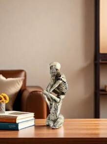 1pc Halloween Party Decor Skeleton Sitting On Gravestone Worried Figurine, Home Decoration