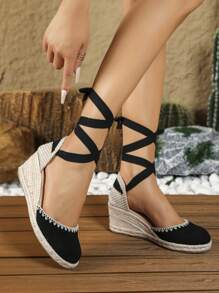 Sandalias de cuña con trenzado para mujer con plataforma impermeable y tacones gruesos, sandalias cerradas con punta redonda para lucir en vacaciones, verano - Negro - Ver 4