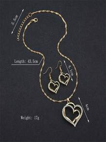 1 set de joyería de moda que incluye 1 par de aretes, 1 collar y 1 brazalete, con un diseño brillante en forma de corazón, color dorado y pedrería personalizable. Un regalo de joyería para mujeres que incluye un Set de pedrería en forma de corazón - Juego de joyas de amor de 4 piezas. - Ver 4