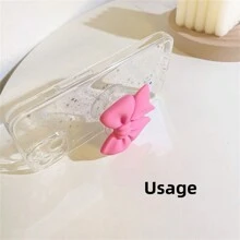 采用 ABS 材质的马卡龙蝴蝶结手机支架，防水，适用于智能手机的多功能支架，彩色哑光桌面支架