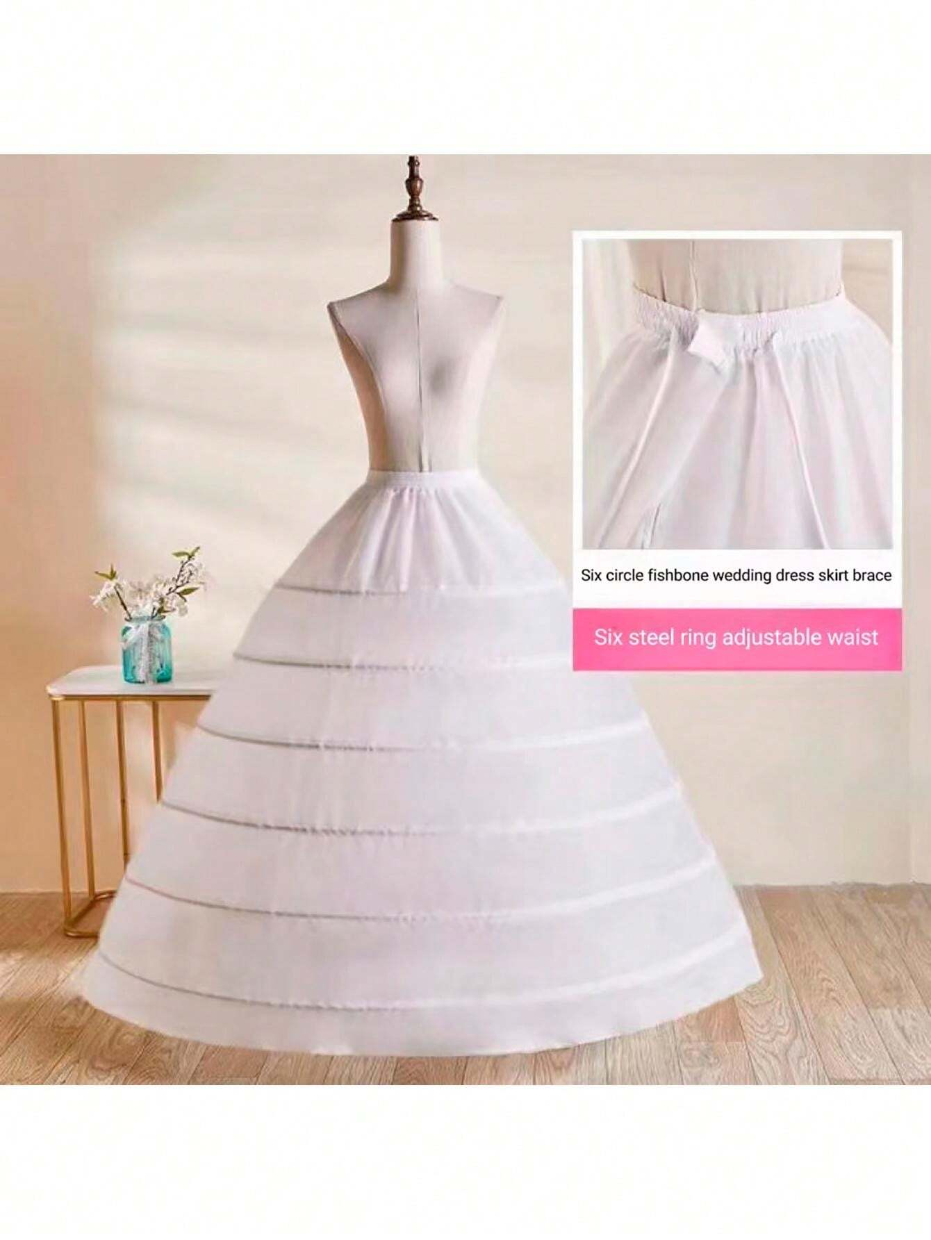 Un abito da sposa bianco sei supporti in acciaio vari tipi di fodere di gonna lunga con