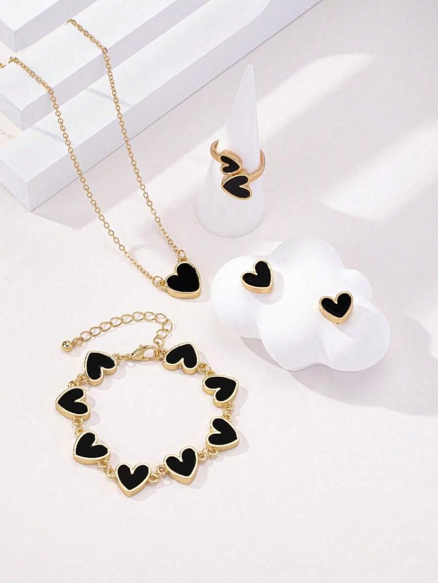 1 Set de pendientes con forma de corazón, adecuado para que las mujeres los usen en primavera y verano - Negro - Ver 1