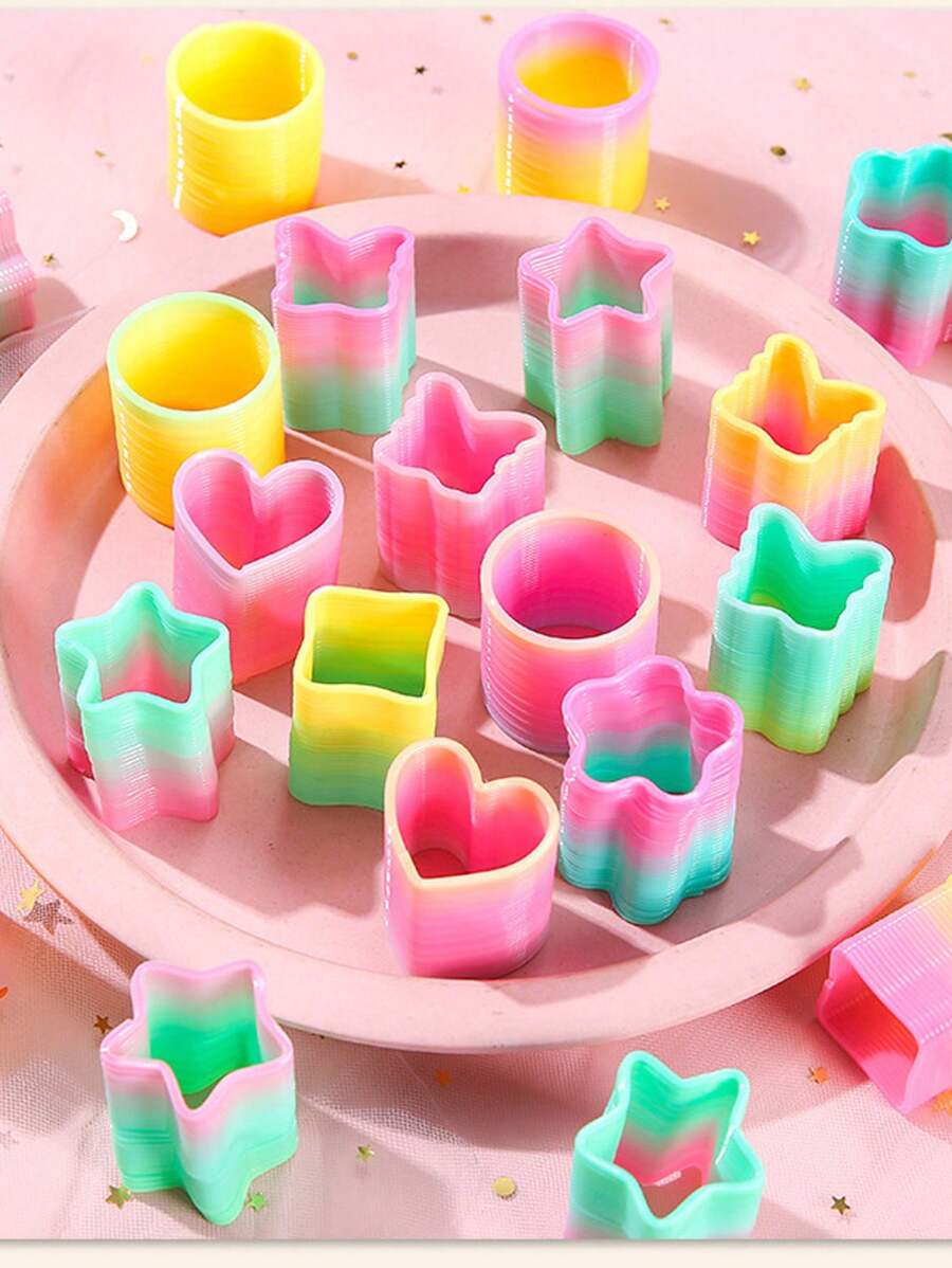 Set de 10 piezas de juguetes de resortes de colores aleatorios, obsequios de fiesta de verano, formas de mariposa, estrella, corazón, resortes asimétricos de arcoíris, resortes de plástico mini, suministros para fiesta de cumpleaños, Halloween, Navidad, relleno de bolsas de fiesta - Multicolor - Ver 1