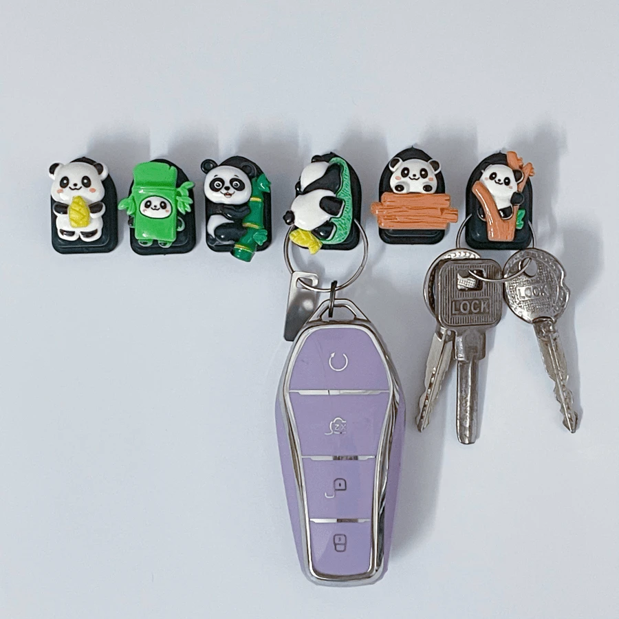 GANCI FORMA GUSCIO compatti e funzionali per appendere a parete