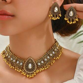 2024 Top-Selling  Arabic Style Zinc Alloy Antique Bronze-Colored Women's Jewelry Set. This Set Includes 1pc Gold Plated Waterdrop Pendant Necklace With Tassel Design & Inlaid Glass Rhinestones, And 1pair Exquisite Bohemian Style Stud Earrings. It's A Perfect Choice For Holiday Gifts And Daily Wear.