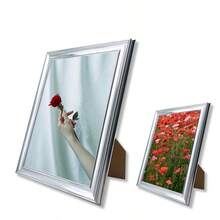 Marco de fotos decorativo plateado para mostrar fotografías de paisajes, retratos, arquitectura, mascotas y otros temas. Puede ser exhibido horizontal o verticalmente. Adecuado para dormitorio, sala de estar, comedor, pasillo, entrada, hotel y otros lugares. (Imagen sólo como referencia, se incluye papel fotográfico al azar) - Plateado - Ver 5