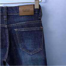 CHUEKITOS. Pantalón de mezclilla para niño corte vaquero, deslavado y con bigotes, con resorte ajustador en la cintura - Azul - Ver 5