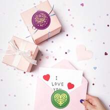 1 个 25 毫米圆形蜡封，配有可拆卸黄铜头、舞狮帽、气球、椰子树、瓶子和蘑菇，用于邀请函、万圣节礼品包装和贺卡。 - 金色 - 查看 5