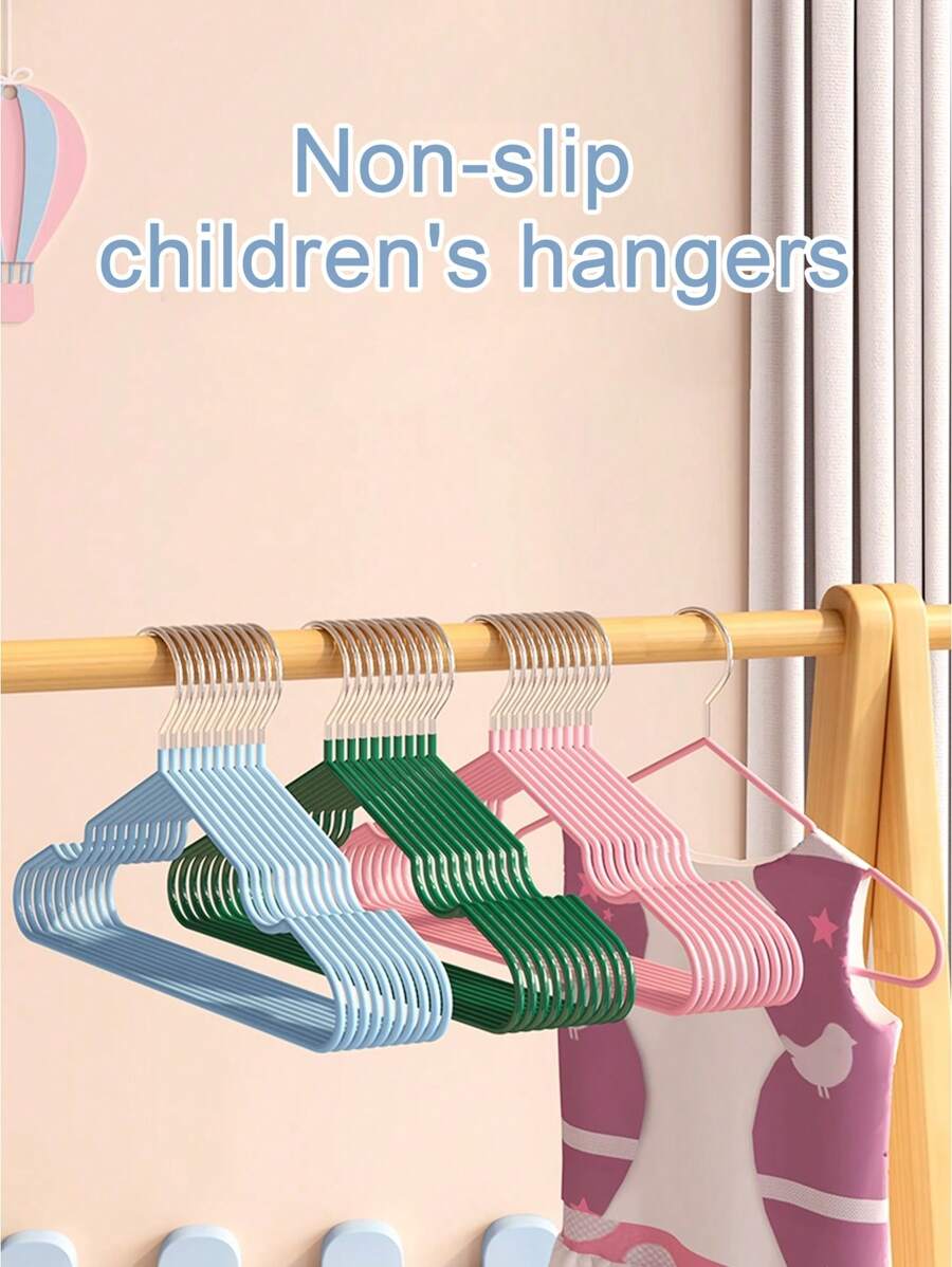 20 piezas de ganchos de ropa para niños y bebés de colores variados con revestimiento antideslizante, ganchos de ropa de acero inoxidable con diseño de arcoíris de dibujos animados que no dejan marcas - Percha antideslizante para ropa de bebé de plástico para niños - Ver 1