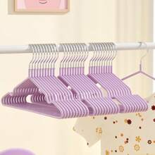 20 piezas de ganchos de ropa para niños y bebés de colores variados con revestimiento antideslizante, ganchos de ropa de acero inoxidable con diseño de arcoíris de dibujos animados que no dejan marcas - Percha antideslizante para ropa de bebé de plástico para niños - Ver 18