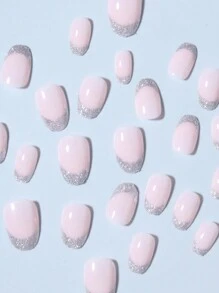 ¡Mejora tu apariencia al instante! Este set de 24 piezas de pegatinas de uñas francesas ovaladas cortas con brillo, hechas de material acrílico, incluye 1 pieza de gel de gelatina y 1 pieza de lima de uñas. Adecuado para mujeres y niñas para manualidades, se puede usar para el trabajo, el estudio y las fiestas. Uñas postizas - Ver 4