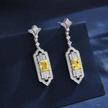 Pendientes exquisitos de cobre amarillo con circonita cúbica