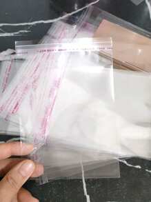 100个/套透明自粘密封塑料礼品袋，非常适合派对糖果和珠宝包装 - 無色 - 查看 1
