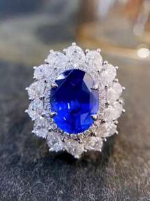 Phong cách thời trang Nhẫn Sapphire màu xanh lam thanh lịch bằng bạc 925, Thiết kế bốn ngạnh hình bầu dục, Khảm kim cương hình giọt nước sáng bóng. Thích hợp cho các quý cô dự tiệc tối, đám cưới sang trọng hoặc bất kỳ dịp nào khác. - Nhiều màu - Xem 1