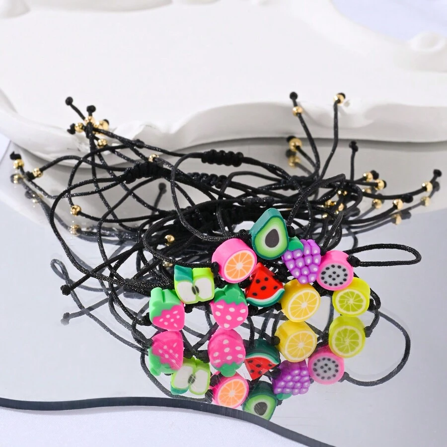 Bracelet à gros fil unique de collection de fil noir de style mignon et minimaliste avec bijoux en céramique douce en forme de fruit, adapté pour un usage quotidien et comme cadeau