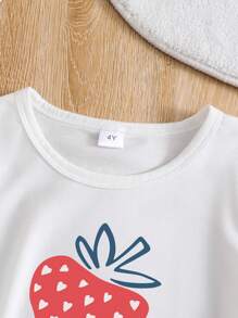 Conjunto de ropa casual para niña joven con camiseta de manga corta de verano con impresión de letras y fresa, y falda de mezclilla