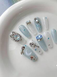 10 chiếc móng tay giả hình quan tài thủ công đính đá quý màu xanh, cây đũa thần, hình lưỡi liềm, nơ bạc, trái tim bằng kim cương giả. Thích hợp cho phụ nữ, bé gái, sinh viên, tiệc tùng, nhân viên văn phòng, có thể tái sử dụng, đeo vào, đi kèm 1 keo thạch và 1 dũa móng tay. - Màu xanh nhạt - Xem 3