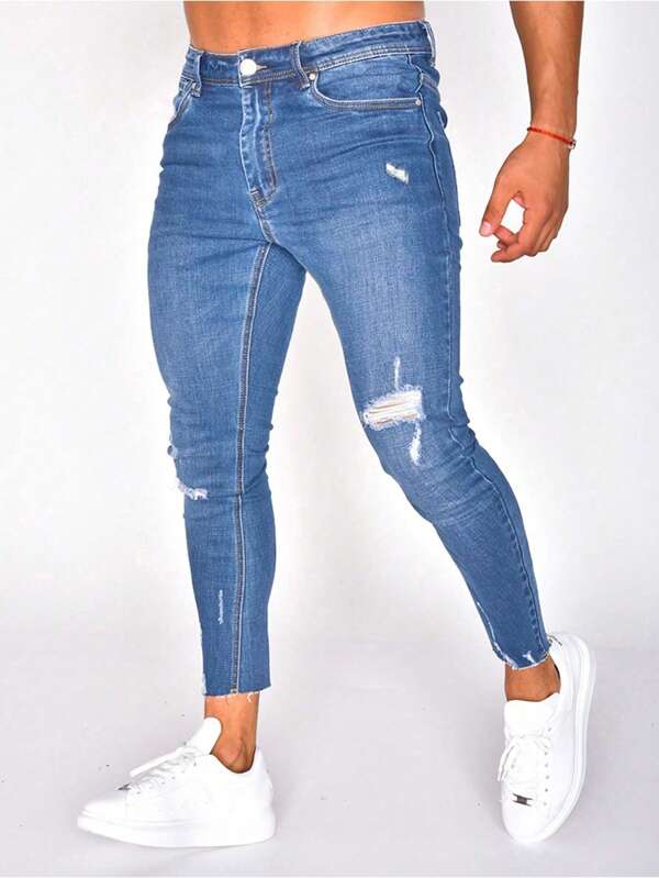 Uomo Jeans skinny con strappati con taglio grezzo
