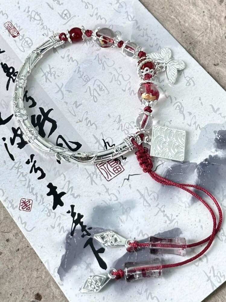 1 pezzo Nuovo Braccialetto rosso premium di stile cinese con nodi di bambù, nappe e farfalle Regalo intrecciato a mano con design regolabile per amici