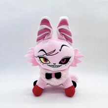 Diferentes muñecos de peluche de gatos bicolores y coloridos con moño